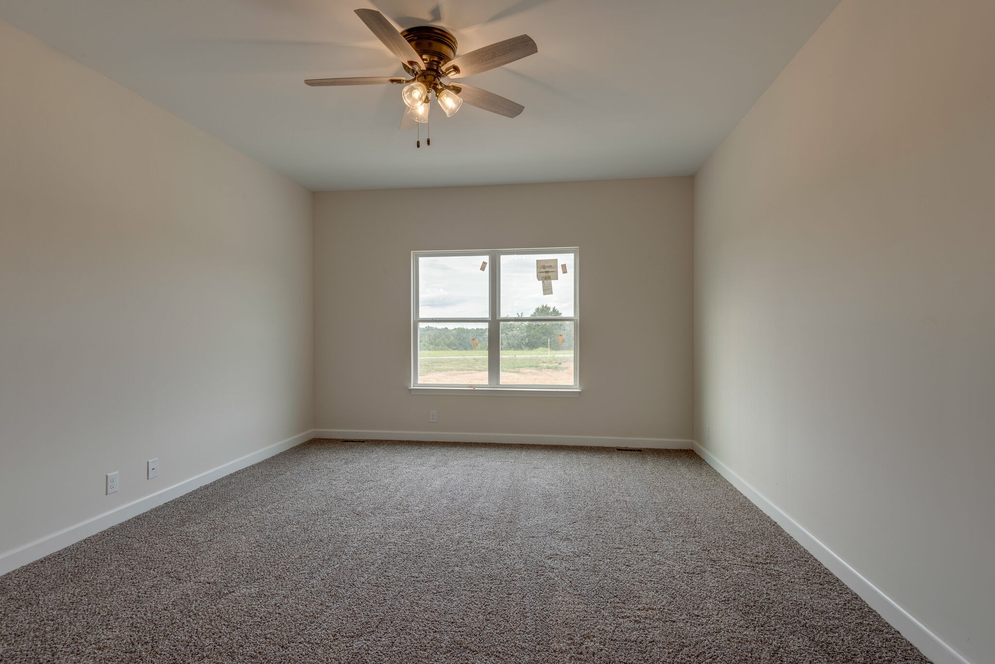 1202 Oak Grove Road Dickson, TN 37055 - Photo 17 of 28 an empty room with a window and a fan