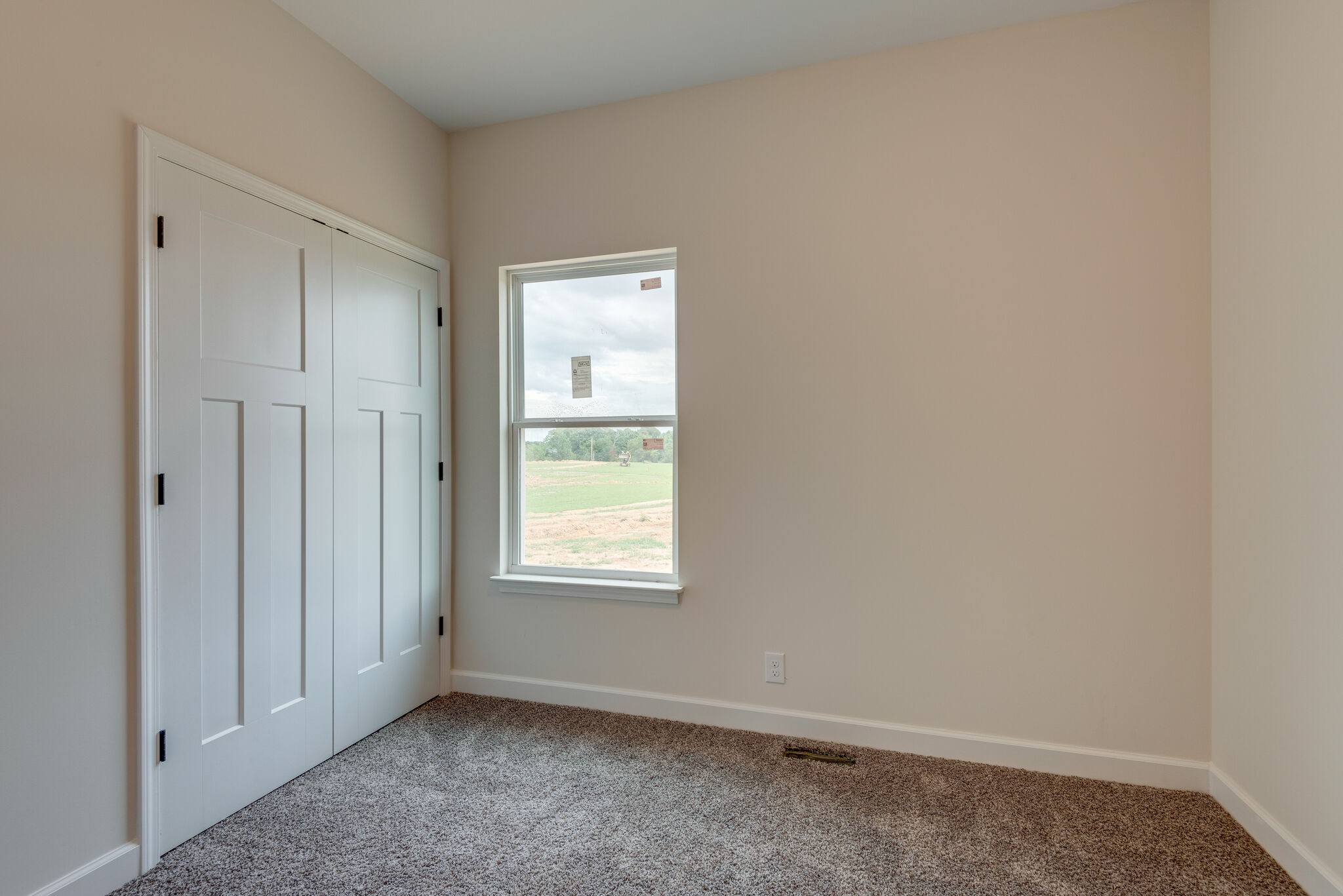 1202 Oak Grove Road Dickson, TN 37055 - Photo 23 of 28 an empty room with windows and closet