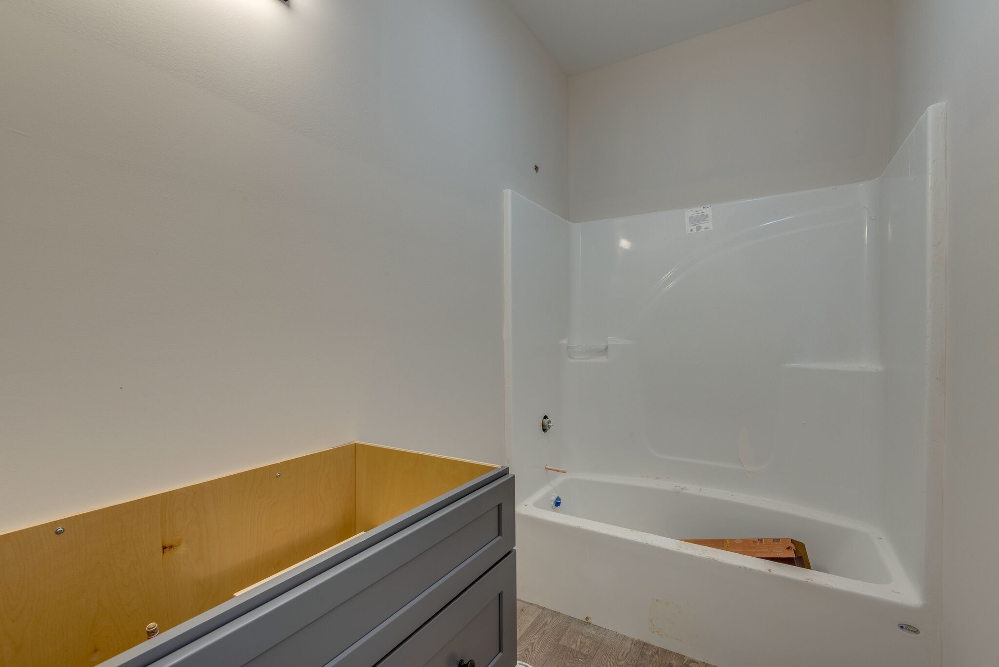 1202 Oak Grove Road Dickson, TN 37055 - Photo 25 of 28 a bathroom with a tub and shower