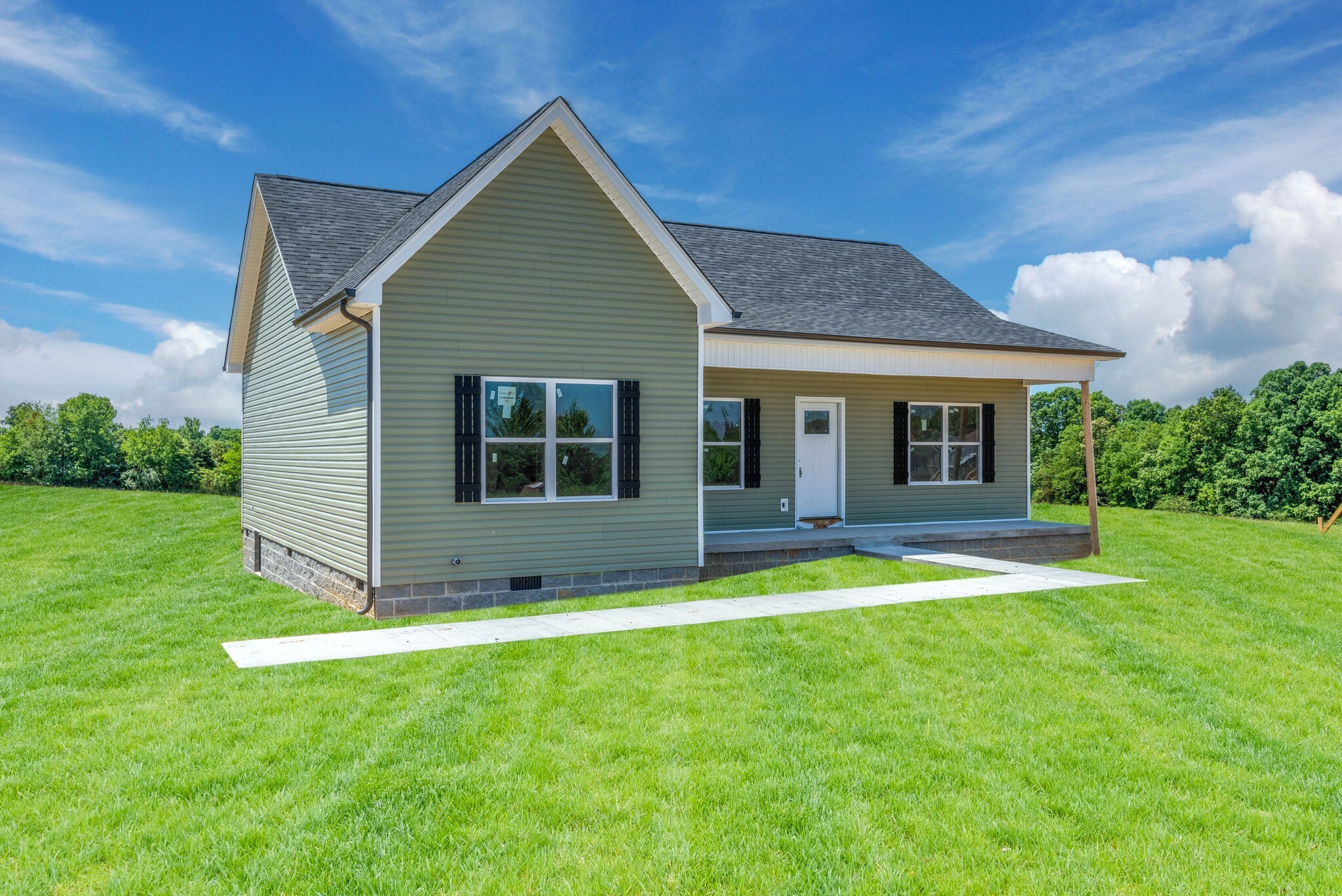 1202 Oak Grove Road Dickson, TN 37055 - Photo 28 of 28 a view of a house with a yard
