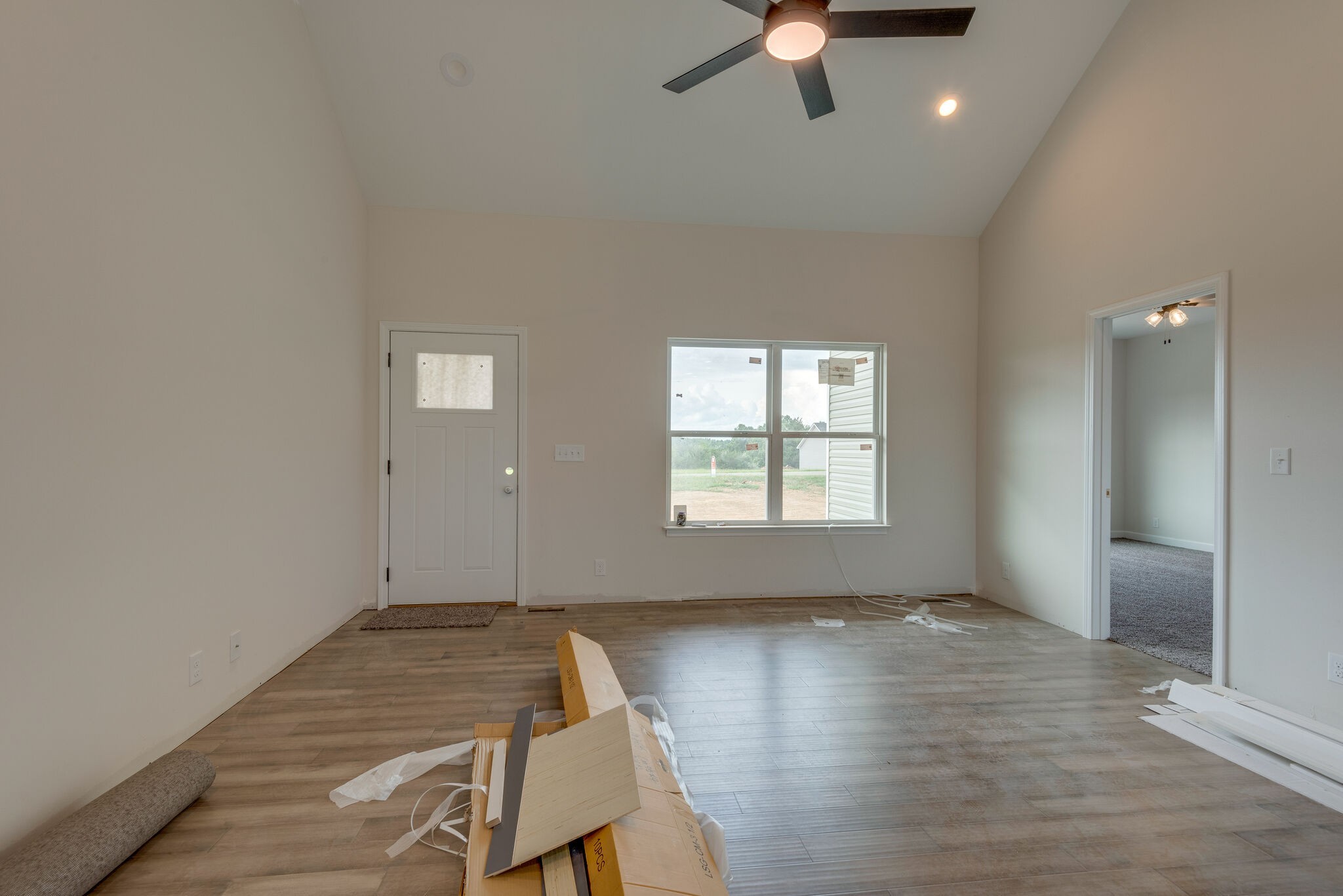 1202 Oak Grove Road Dickson, TN 37055 - Photo 6 of 28 wooden floor in an empty room with a window