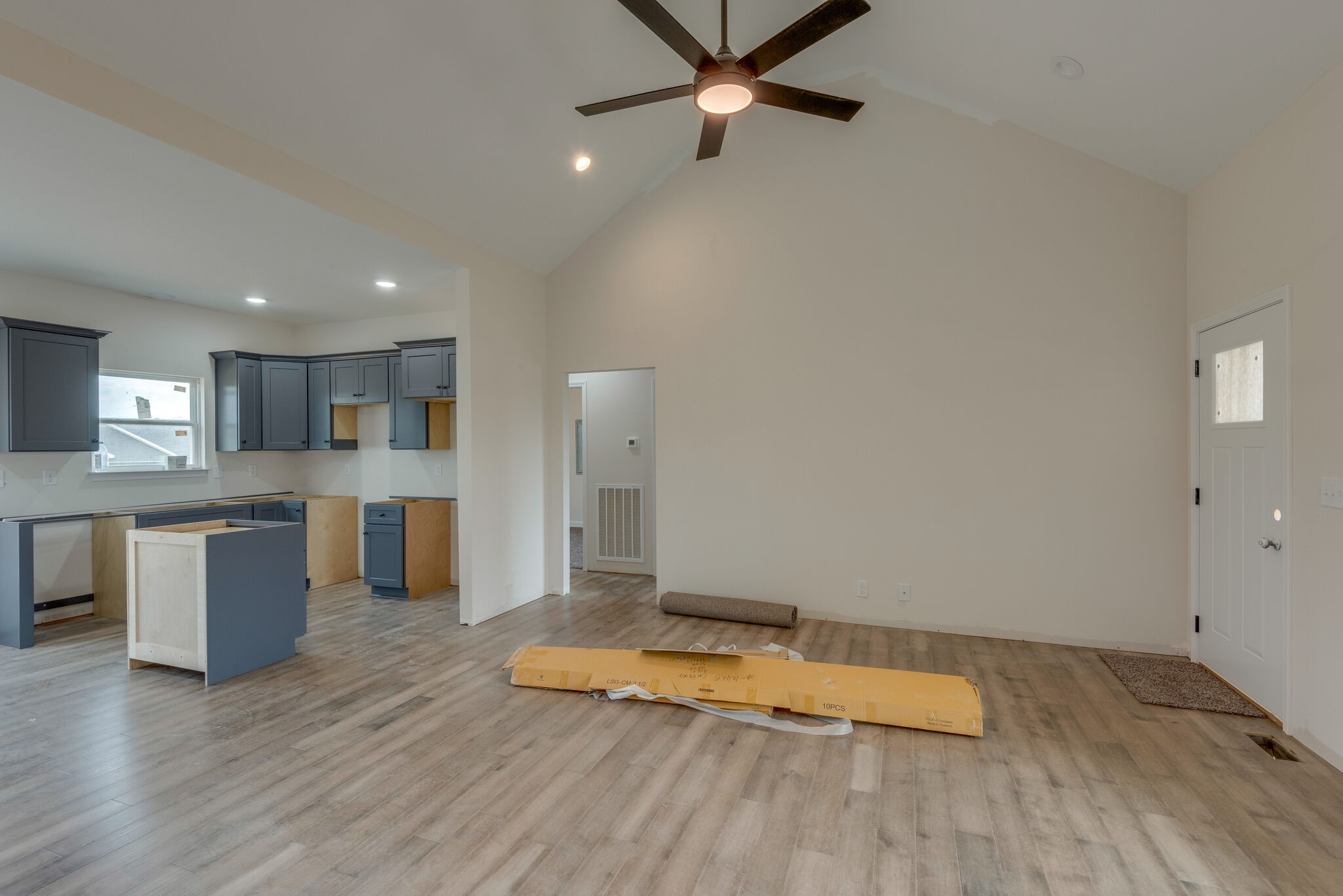 1202 Oak Grove Road Dickson, TN 37055 - Photo 9 of 28 a view of a kitchen with a sink and a refrigerator