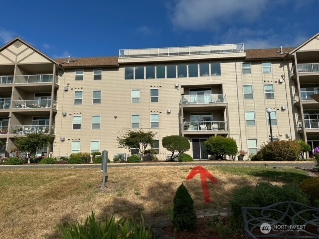 1548 River Road, Unit 105 Longview, WA 98632 - Photo 23 of 25 a front view of building with street