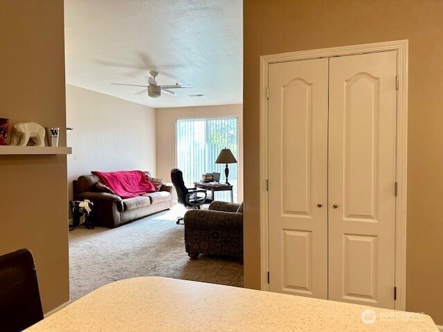 1548 River Road, Unit 105 Longview, WA 98632 - Photo 5 of 25 a living room with furniture and a window