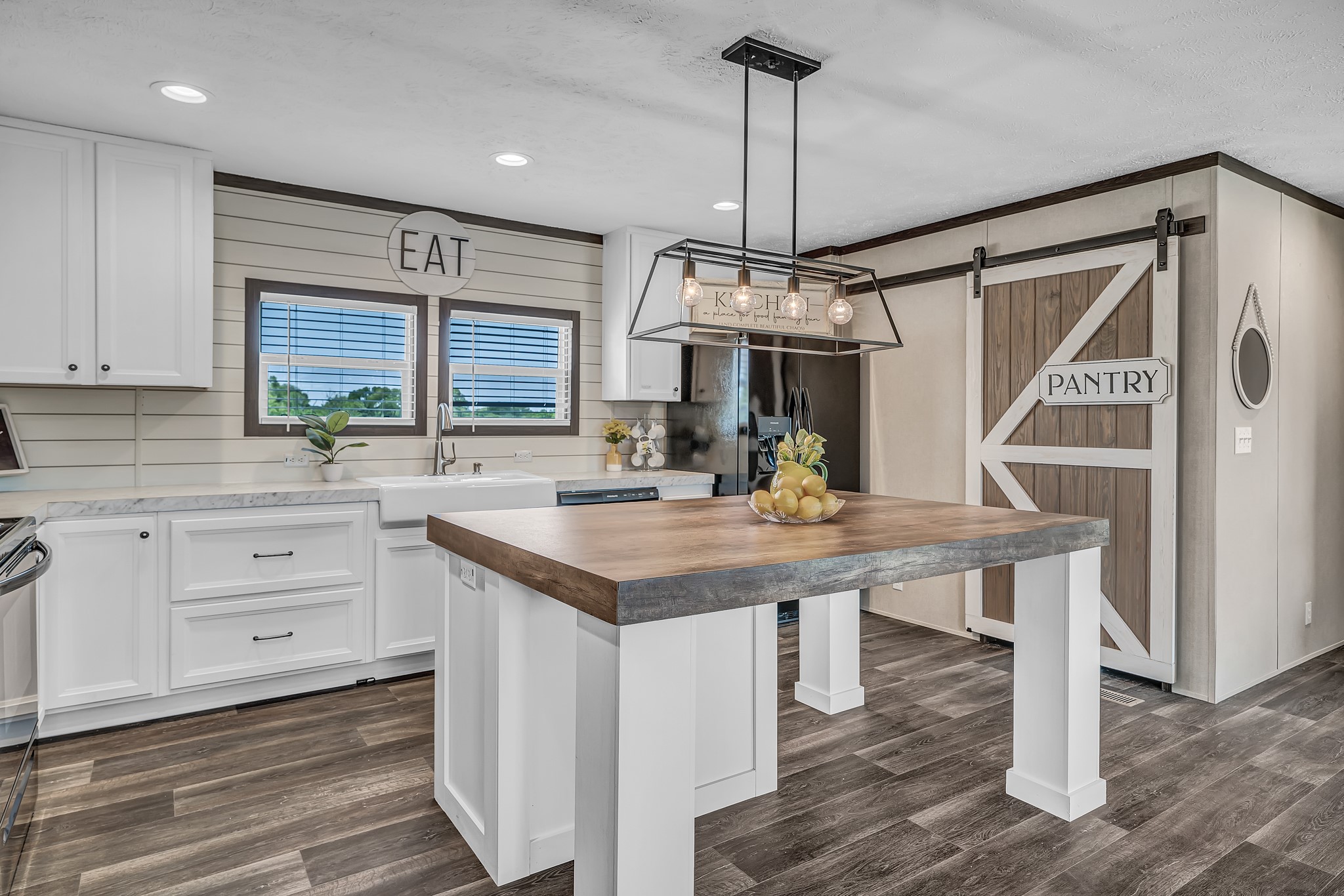 2747 Old Masonic Road Brenham, TX 77833 - Photo 11 of 28 a kitchen with a sink stainless steel appliances and cabinets