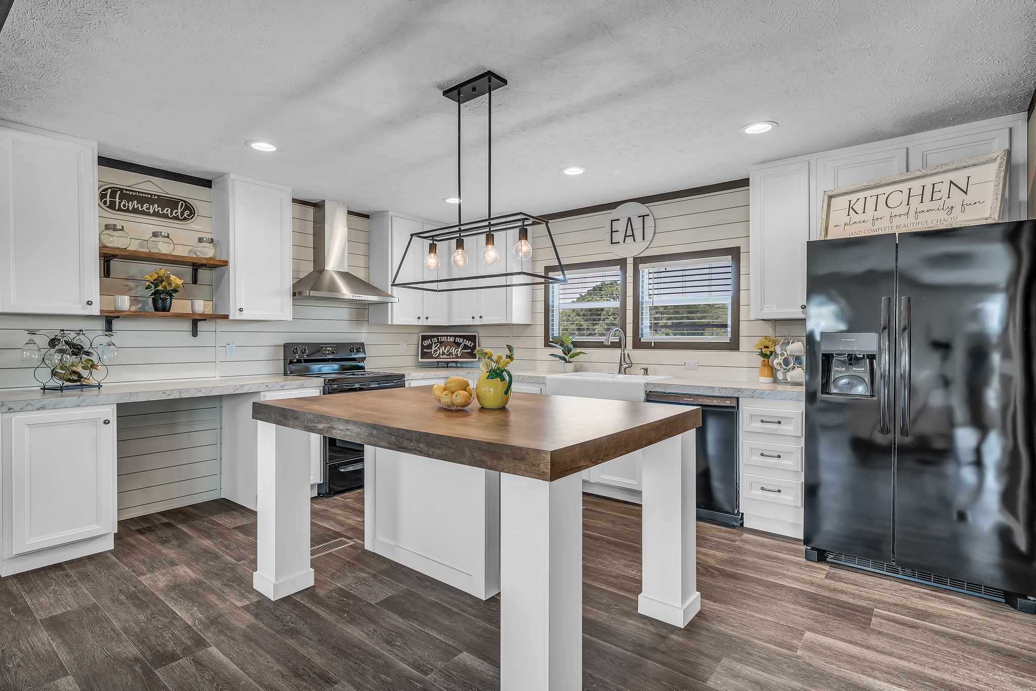 2747 Old Masonic Road Brenham, TX 77833 - Photo 12 of 28 a kitchen with kitchen island granite countertop a sink appliances and cabinets