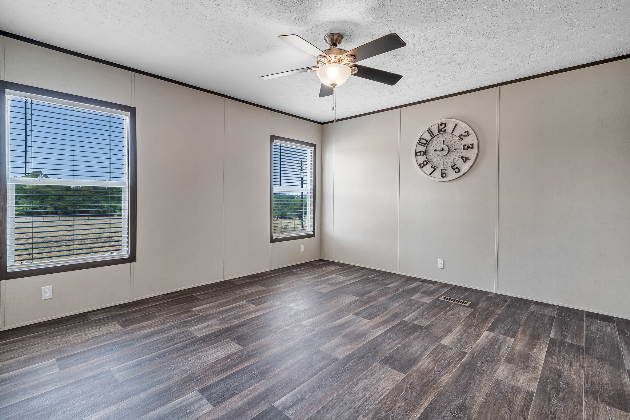 2747 Old Masonic Road Brenham, TX 77833 - Photo 15 of 28 a view of an empty room with a window and a ceiling fan