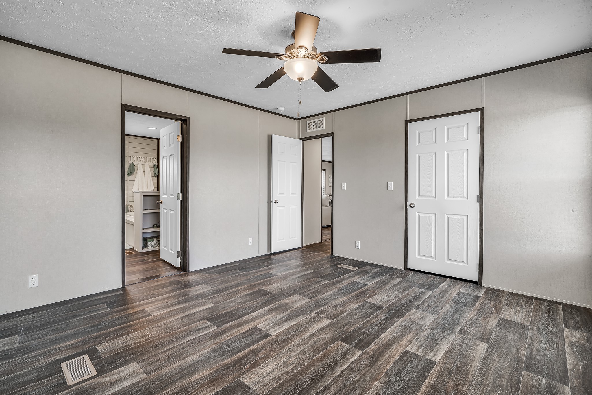 2747 Old Masonic Road Brenham, TX 77833 - Photo 16 of 28 a view of an empty room with wooden floor