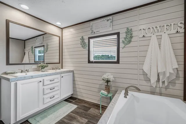 a bathroom with a shower and a sink