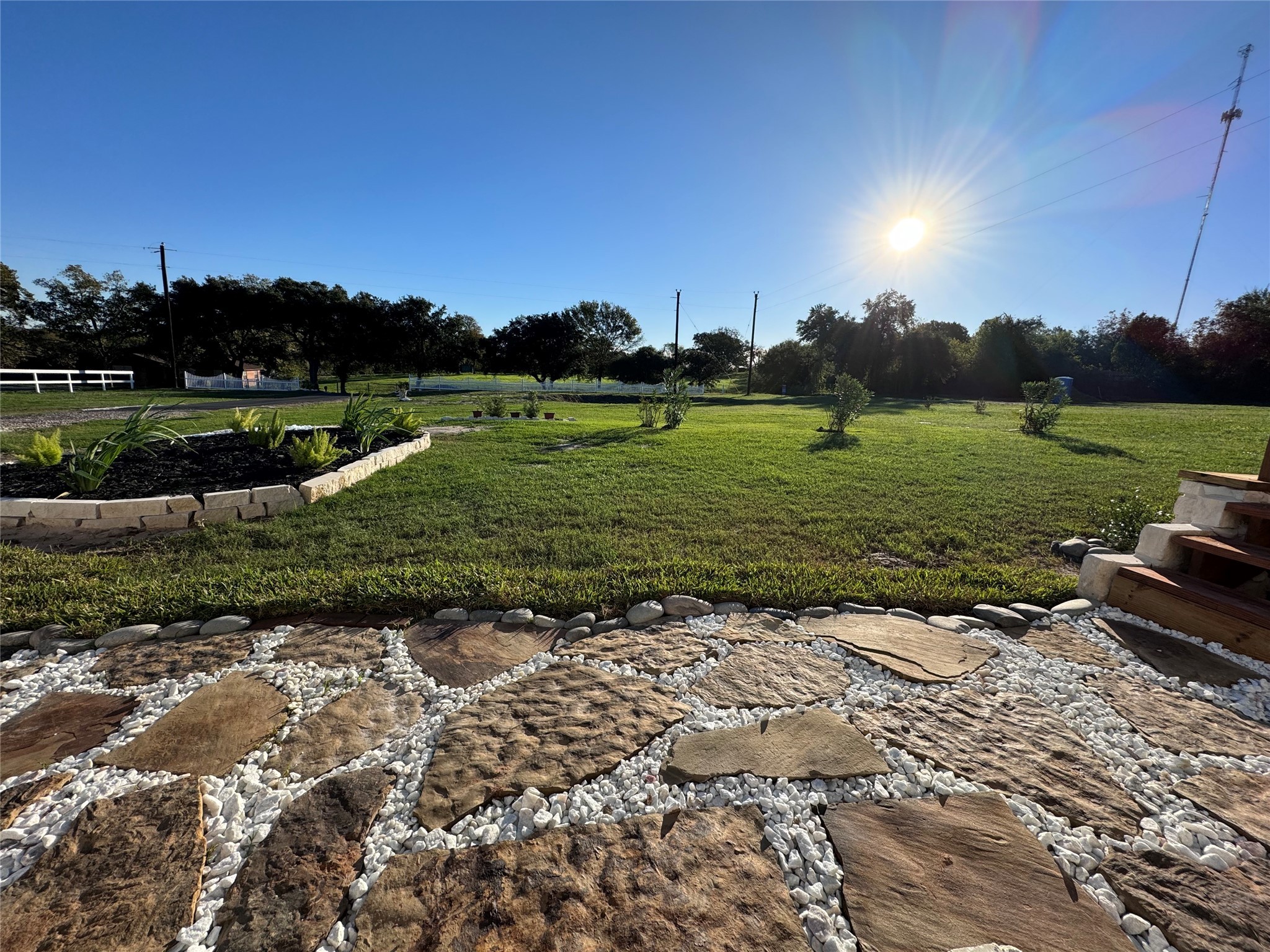 2747 Old Masonic Road Brenham, TX 77833 - Photo 2 of 28 a view of a golf course with a lake