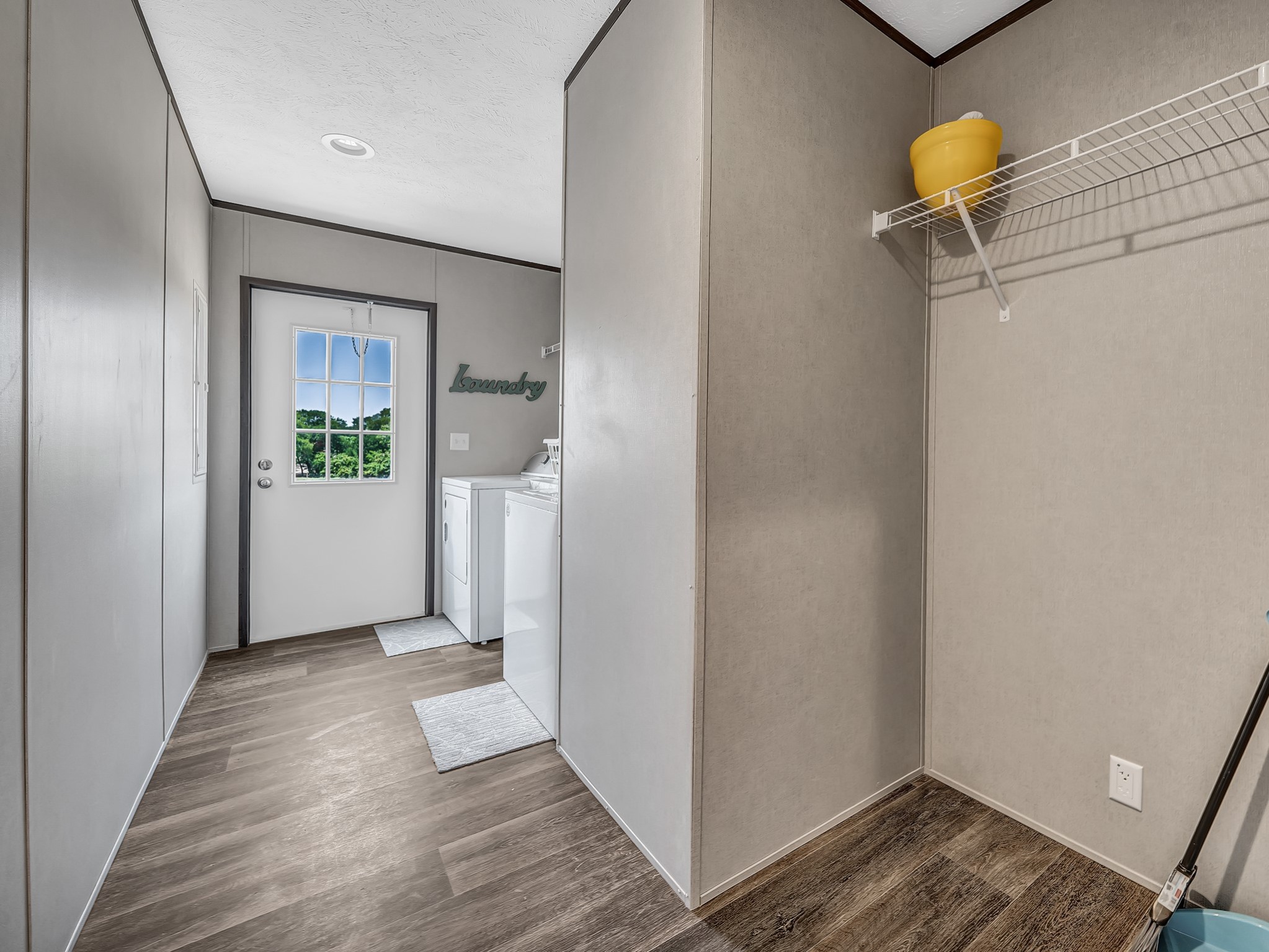 2747 Old Masonic Road Brenham, TX 77833 - Photo 25 of 28 a view of a hallway view with wooden floor and staircase