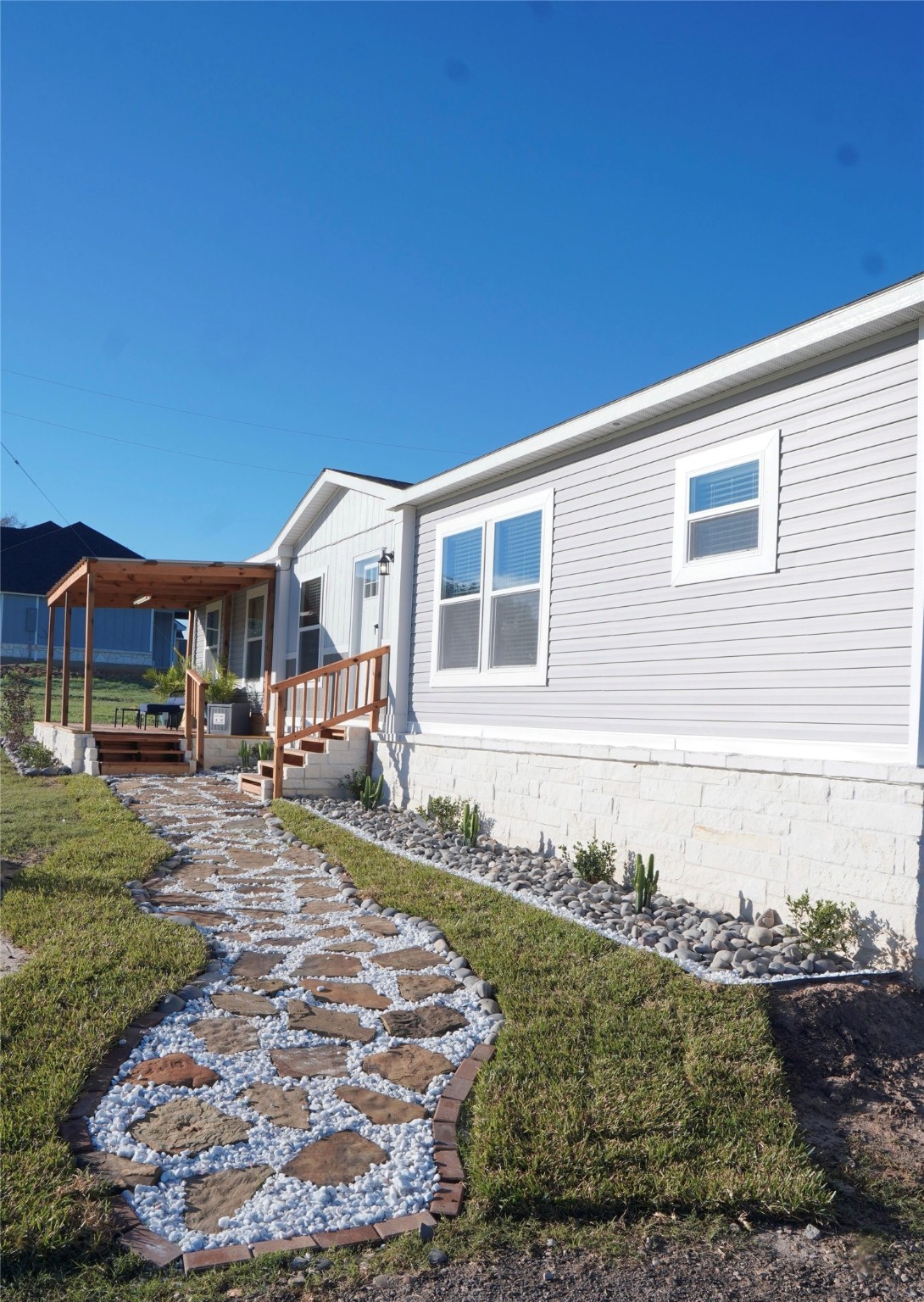 2747 Old Masonic Road Brenham, TX 77833 - Photo 3 of 28 a front view of a house with garden