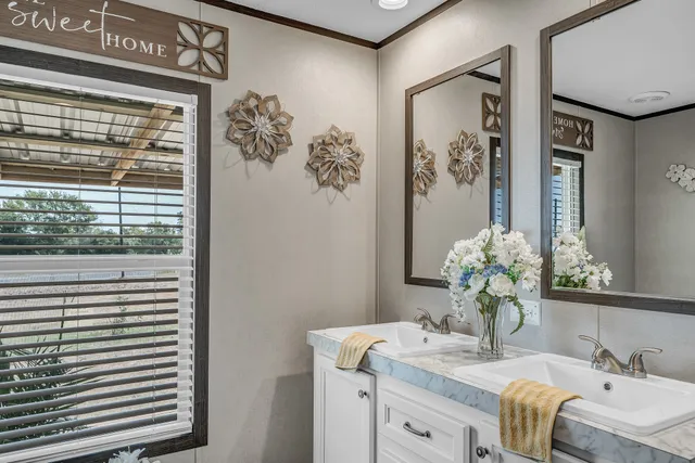 a kitchen with a sink stainless steel appliances and cabinets