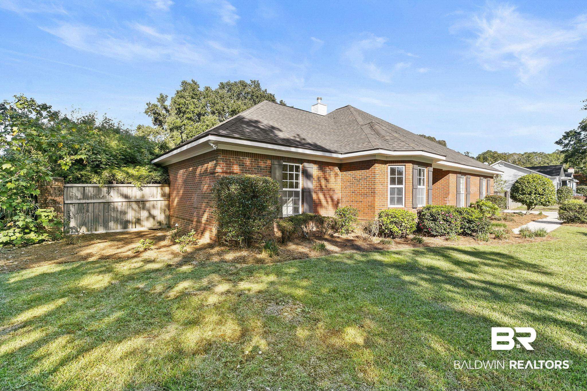 9631 Bay Meadows Avenue Fairhope, AL 36532 - Photo 3 of 49 View of property exterior with a yard
