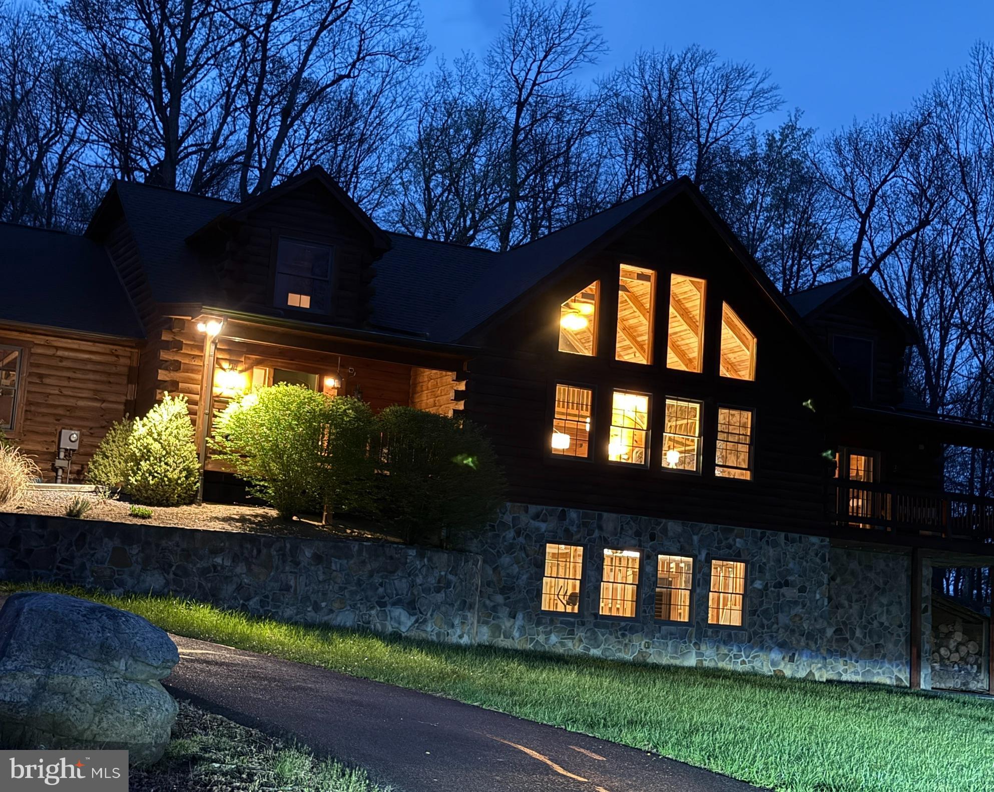 134 Ridgewood Trail Berkeley Springs, WV 25411 - Photo 3 of 7 a view of a house in a yard