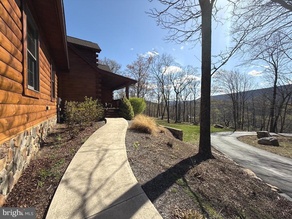 134 Ridgewood Trail Berkeley Springs, WV 25411 - Photo 6 of 7 a view of a patio with a fountain