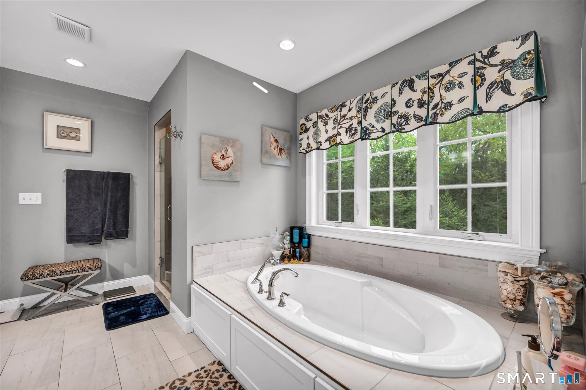16 Sweetheart Mountain Road Canton, CT 06019 - Photo 34 of 40 a bathroom with a bathtub and a window