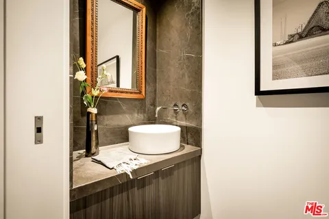 a bathroom with a tub and a shower