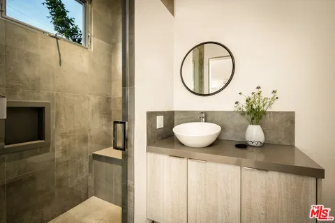 a view of a living room and entry way