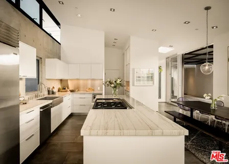 a kitchen with a stove and a microwave