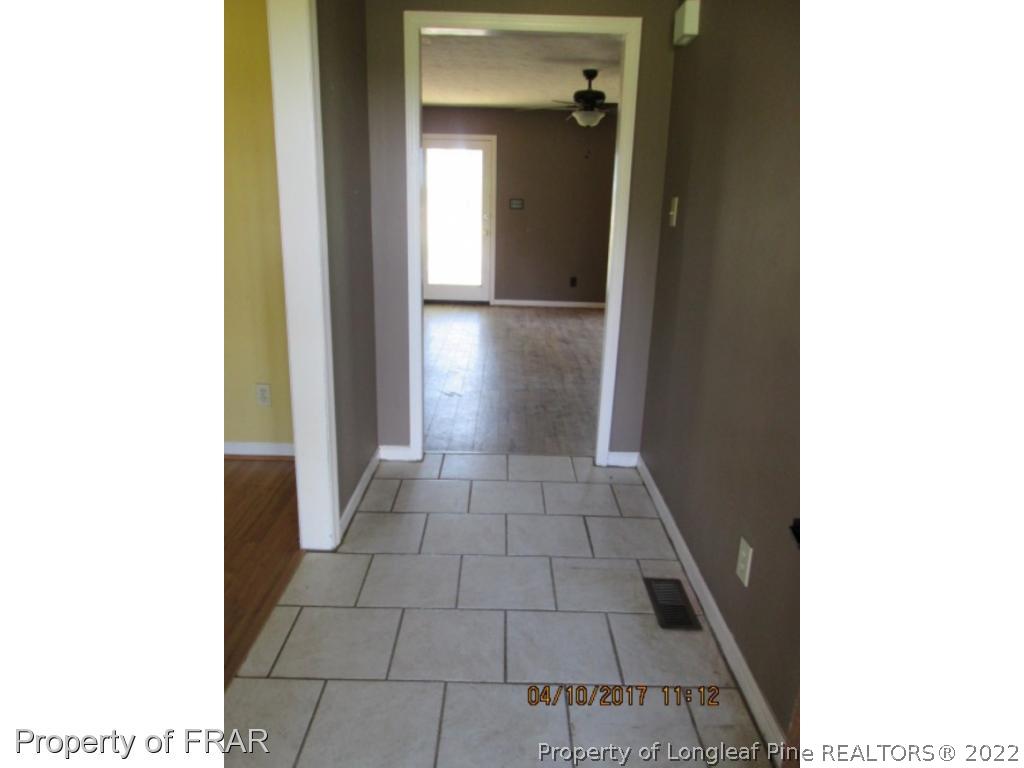 5504 Percy Strickland Road Godwin, NC 28344 - Photo 3 of 15 a view of a hallway