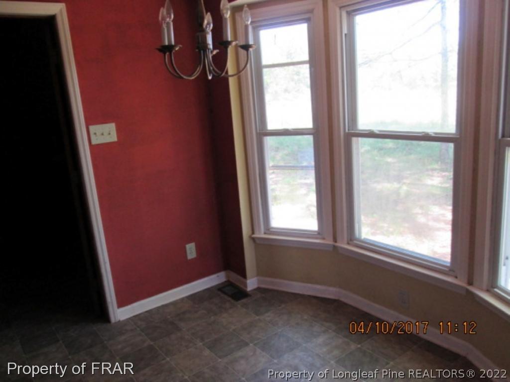 5504 Percy Strickland Road Godwin, NC 28344 - Photo 7 of 15 a view of an empty room with a window