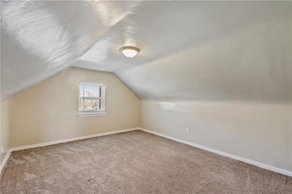 9515 Orchard Road Pittsburgh, PA 15237 - Photo 15 of 28 an empty room with a empty space and a window