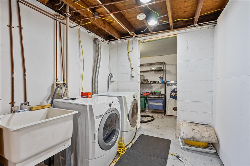 9515 Orchard Road Pittsburgh, PA 15237 - Photo 22 of 28 a utility room with dryer and washer