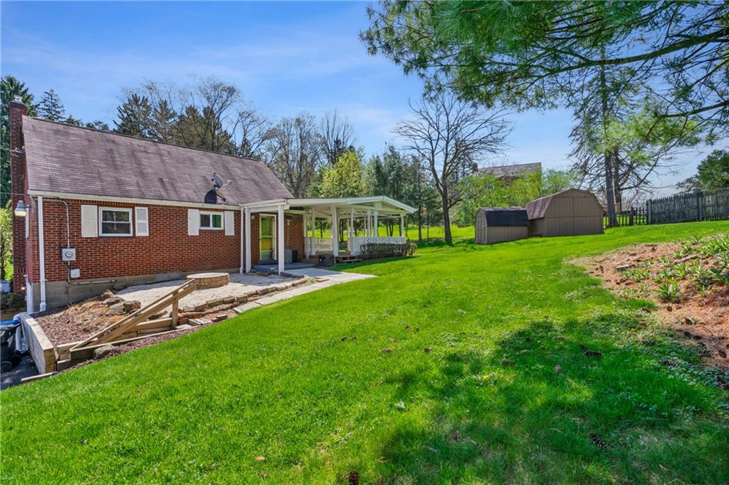 9515 Orchard Road Pittsburgh, PA 15237 - Photo 26 of 28 a view of a house with a backyard porch and sitting area