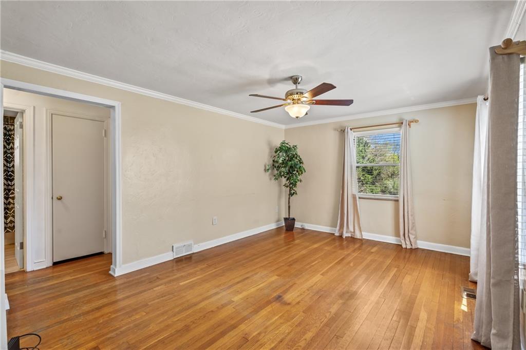 9515 Orchard Road Pittsburgh, PA 15237 - Photo 4 of 28 wooden floor in an empty room with a window