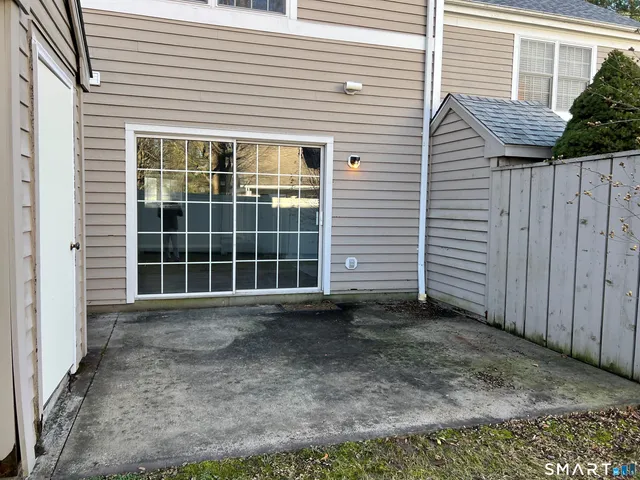 a view of a backyard with a large window