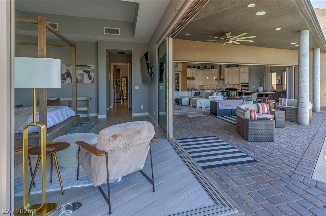 6014 Willow Ridge Court Las Vegas, NV 89135 - Photo 80 of 99 This seamless transition blends indoor comfort with an expansive outdoor living area.