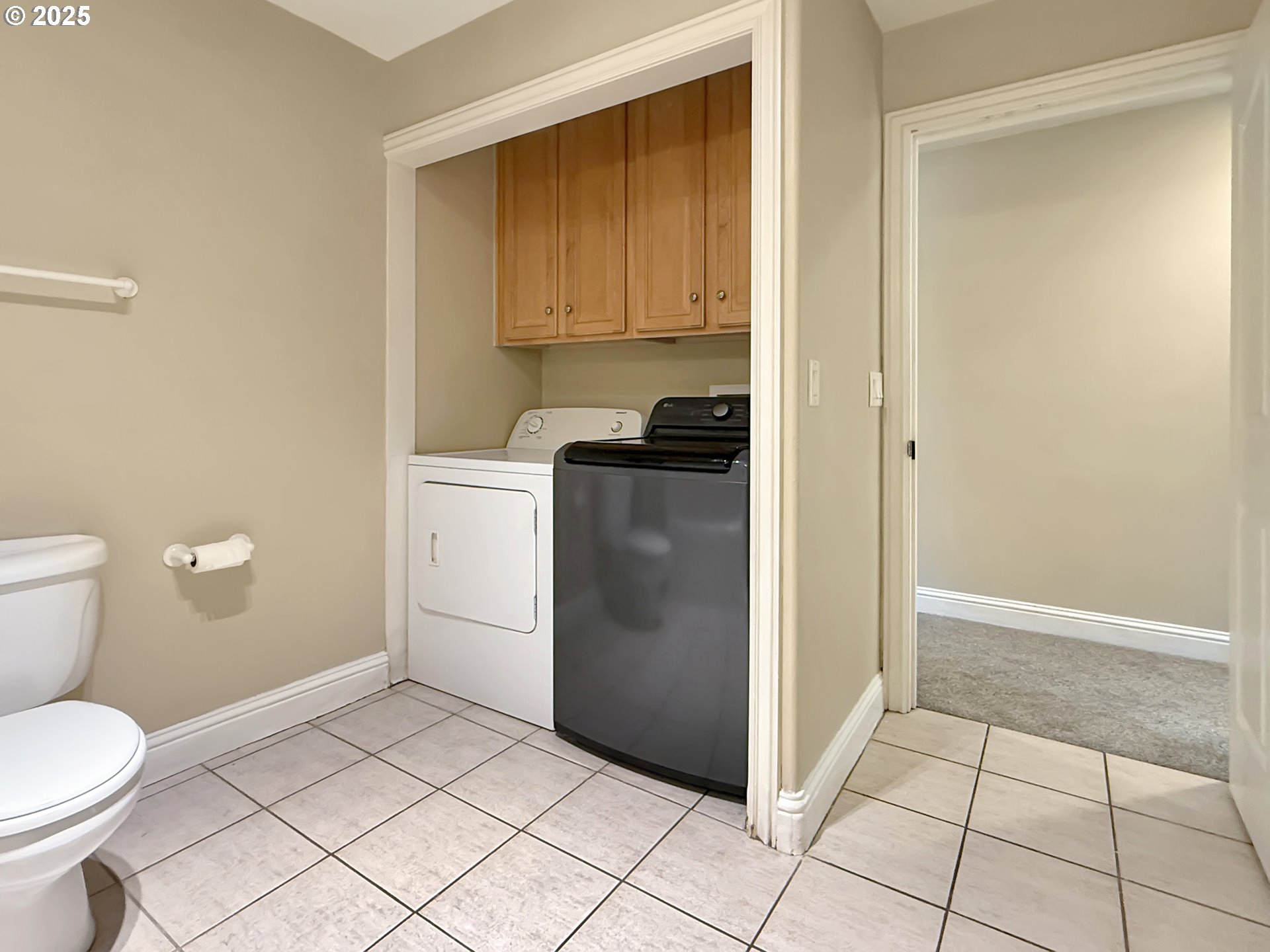 714 Pioneer Road, Unit 1B Brookings, OR 97415 - Photo 30 of 42 a bathroom with a granite countertop sink and a toilet