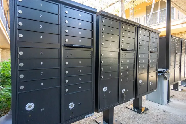 a view of a wooden door and a front door