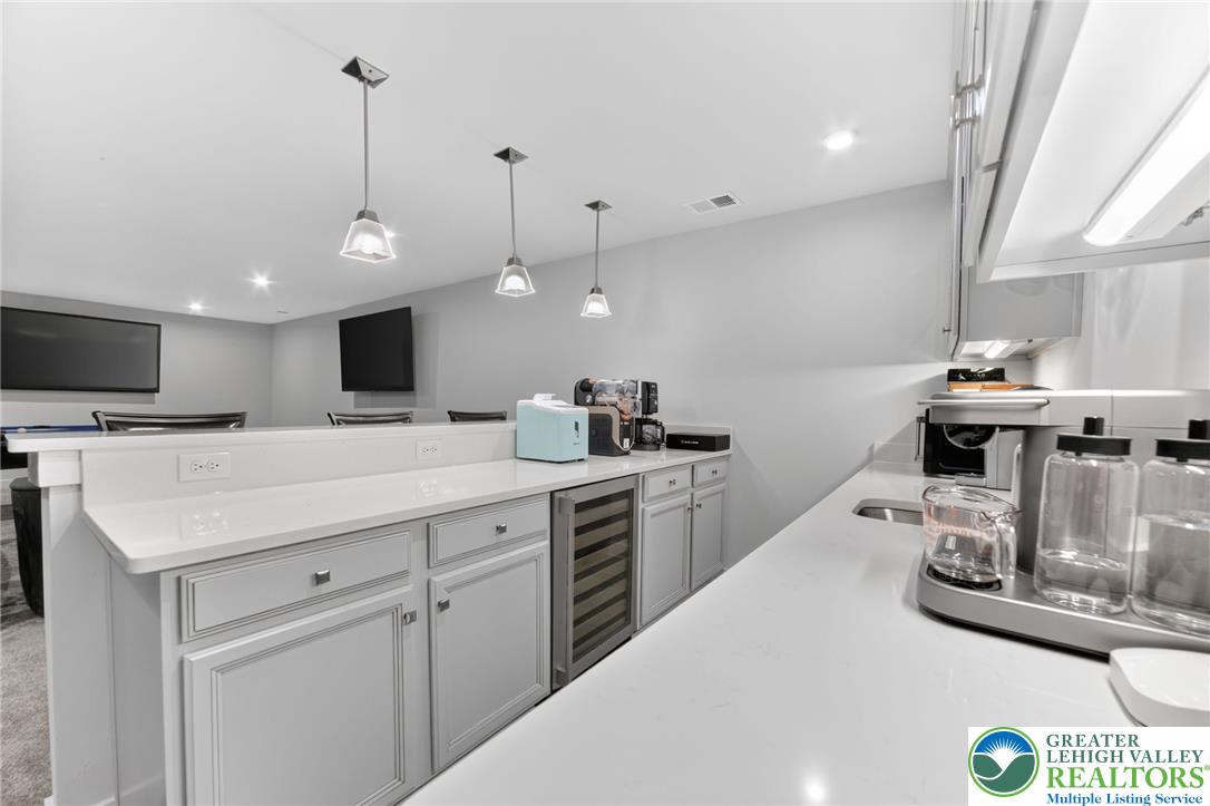 3952 Orth Street Bethlehem, PA 18020 - Photo 42 of 60 A refined kitchen island offers seamless entertainment and culinary creation.
