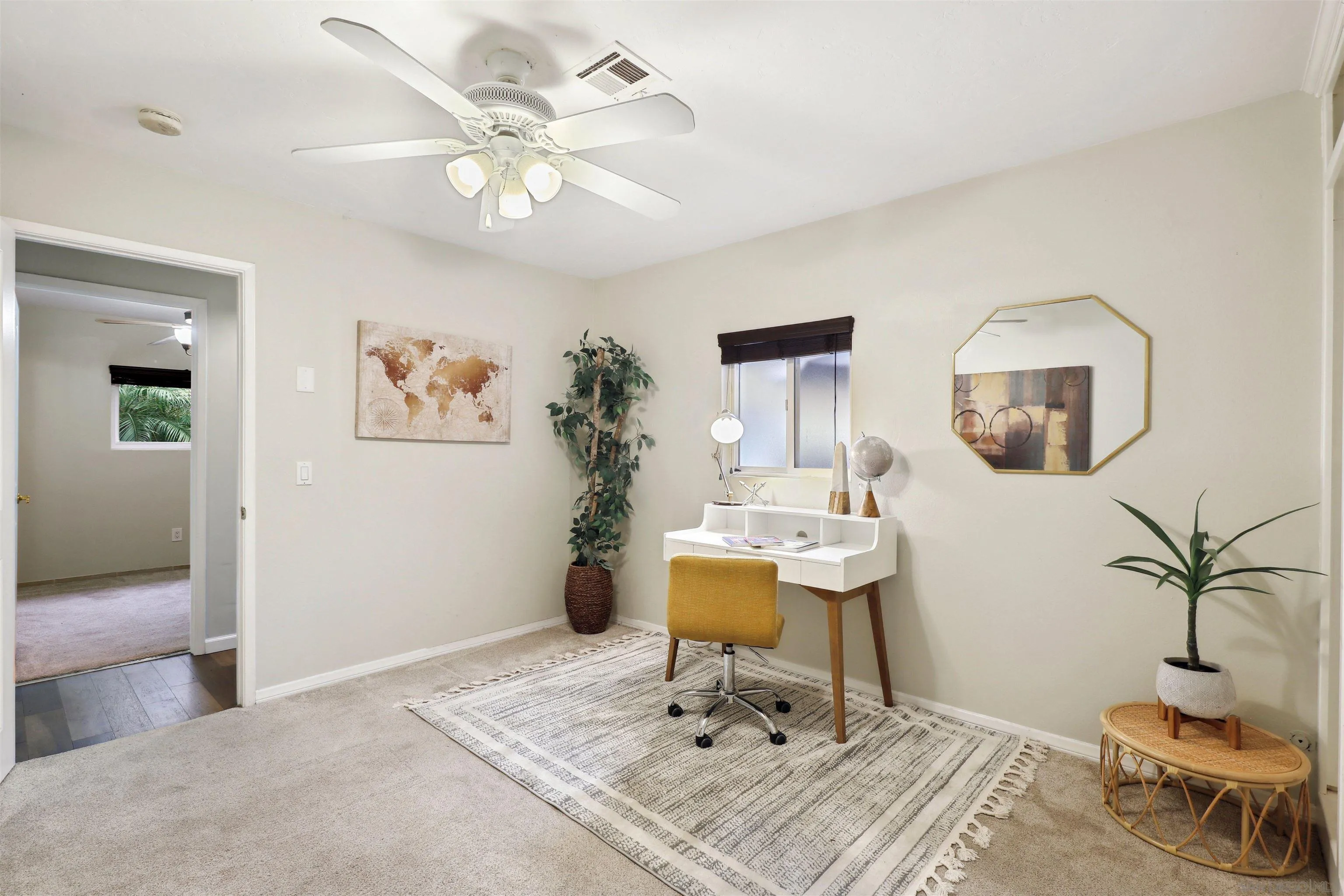 1390 Orpheus Avenue Encinitas, CA 92024 - Photo 18 of 32 a living room with furniture and a potted plant