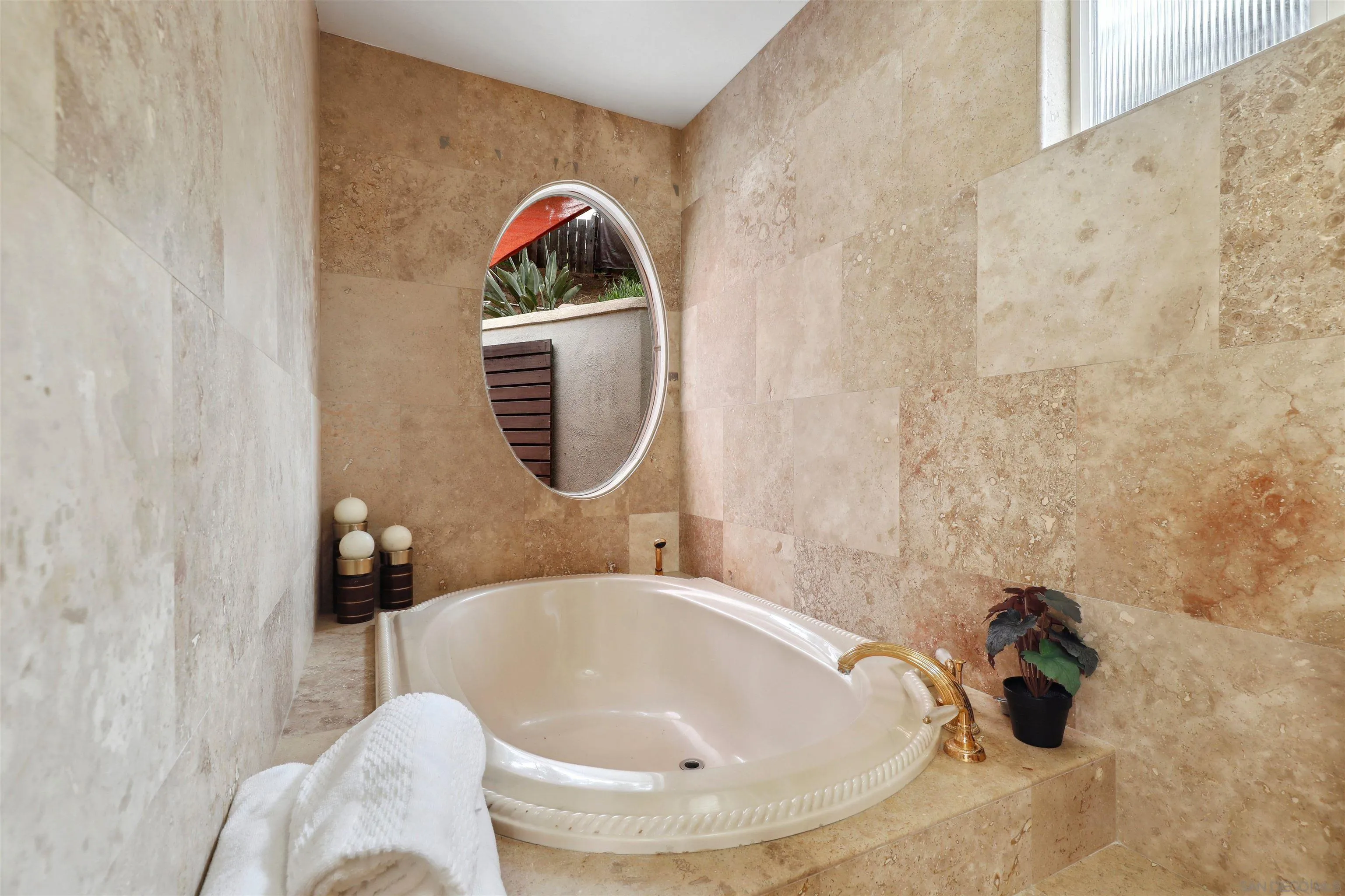 1390 Orpheus Avenue Encinitas, CA 92024 - Photo 23 of 32 a bathroom with a sink and a mirror