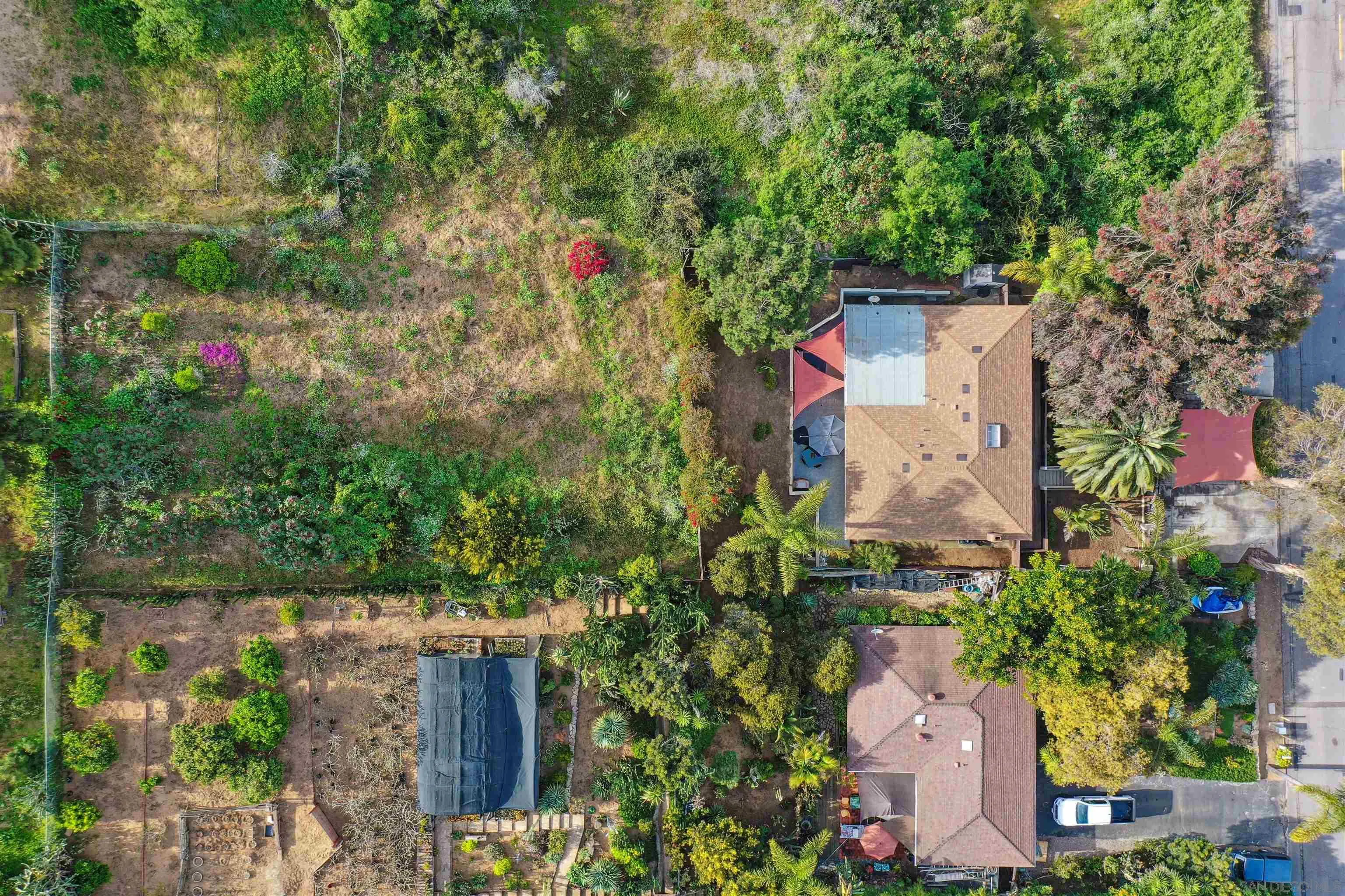 1390 Orpheus Avenue Encinitas, CA 92024 - Photo 26 of 32 an aerial view of residential house with outdoor space and trees all around