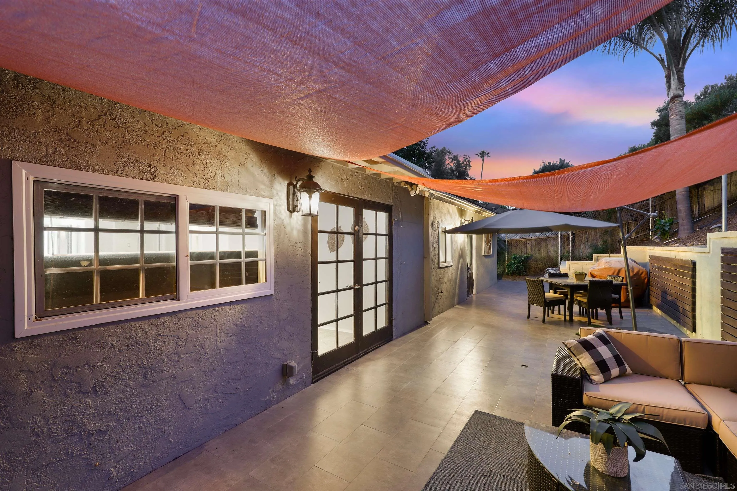 1390 Orpheus Avenue Encinitas, CA 92024 - Photo 28 of 32 a backyard of a house with outdoor seating