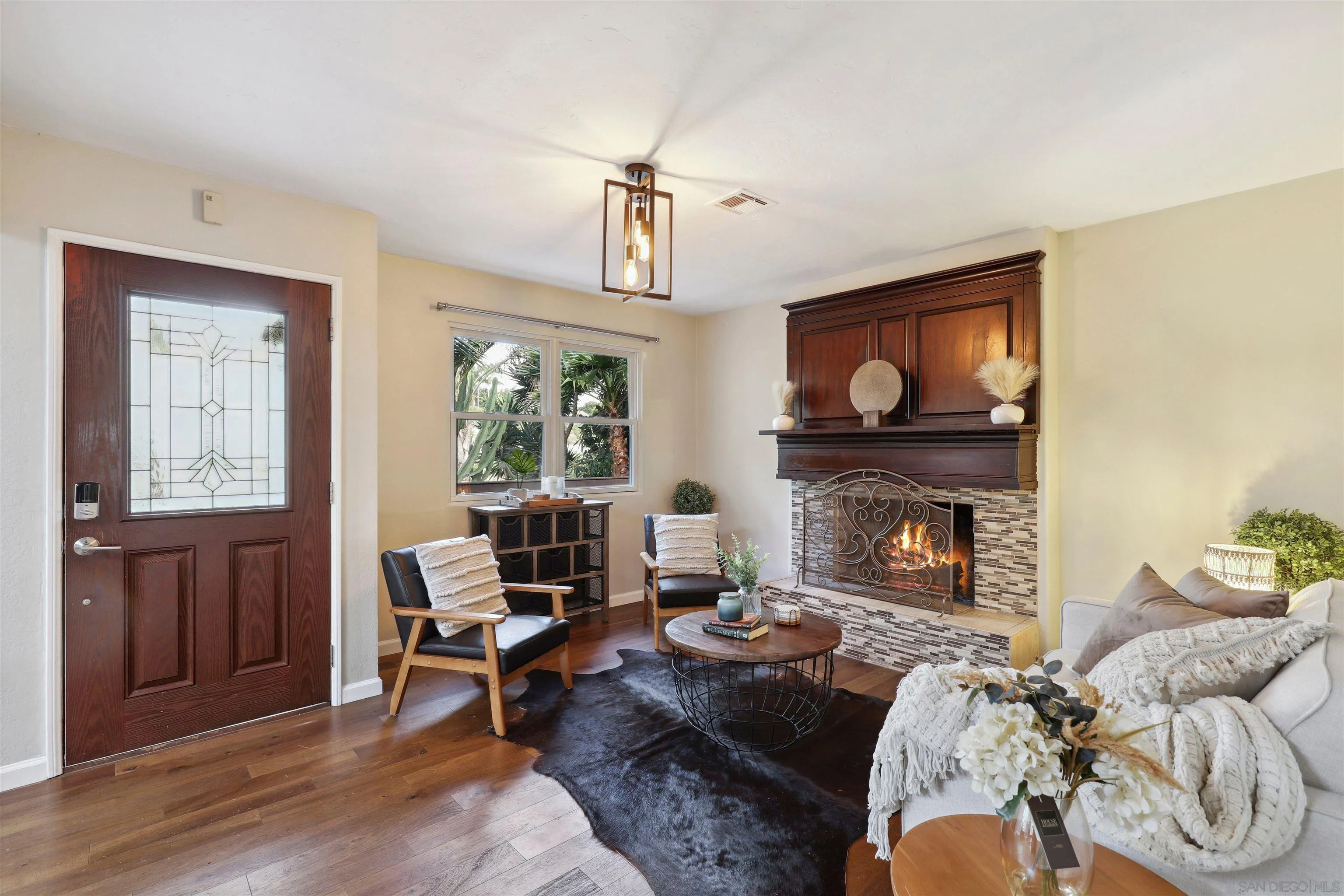 1390 Orpheus Avenue Encinitas, CA 92024 - Photo 3 of 32 a living room with furniture and a fireplace