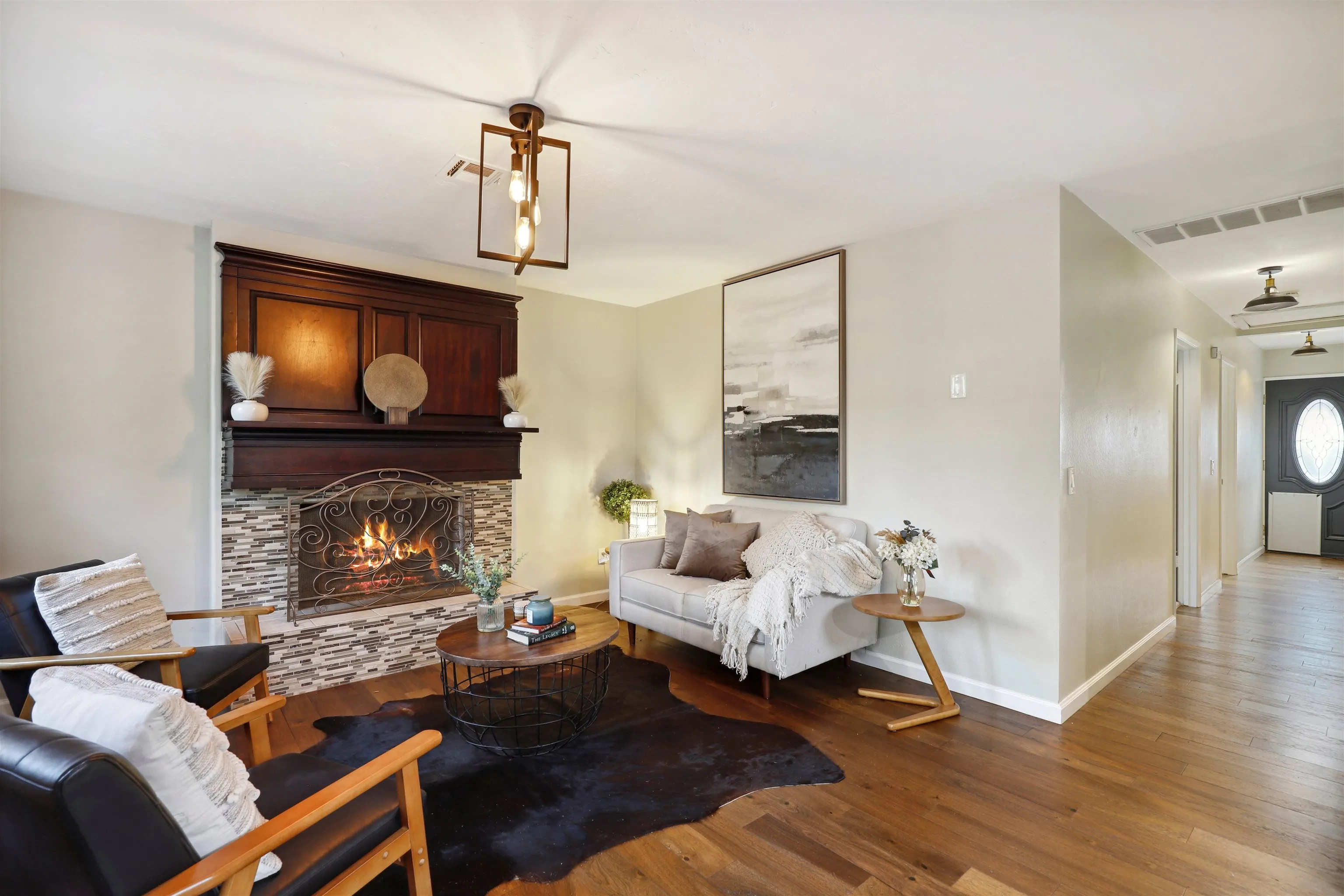 1390 Orpheus Avenue Encinitas, CA 92024 - Photo 4 of 32 a living room with furniture and a fireplace