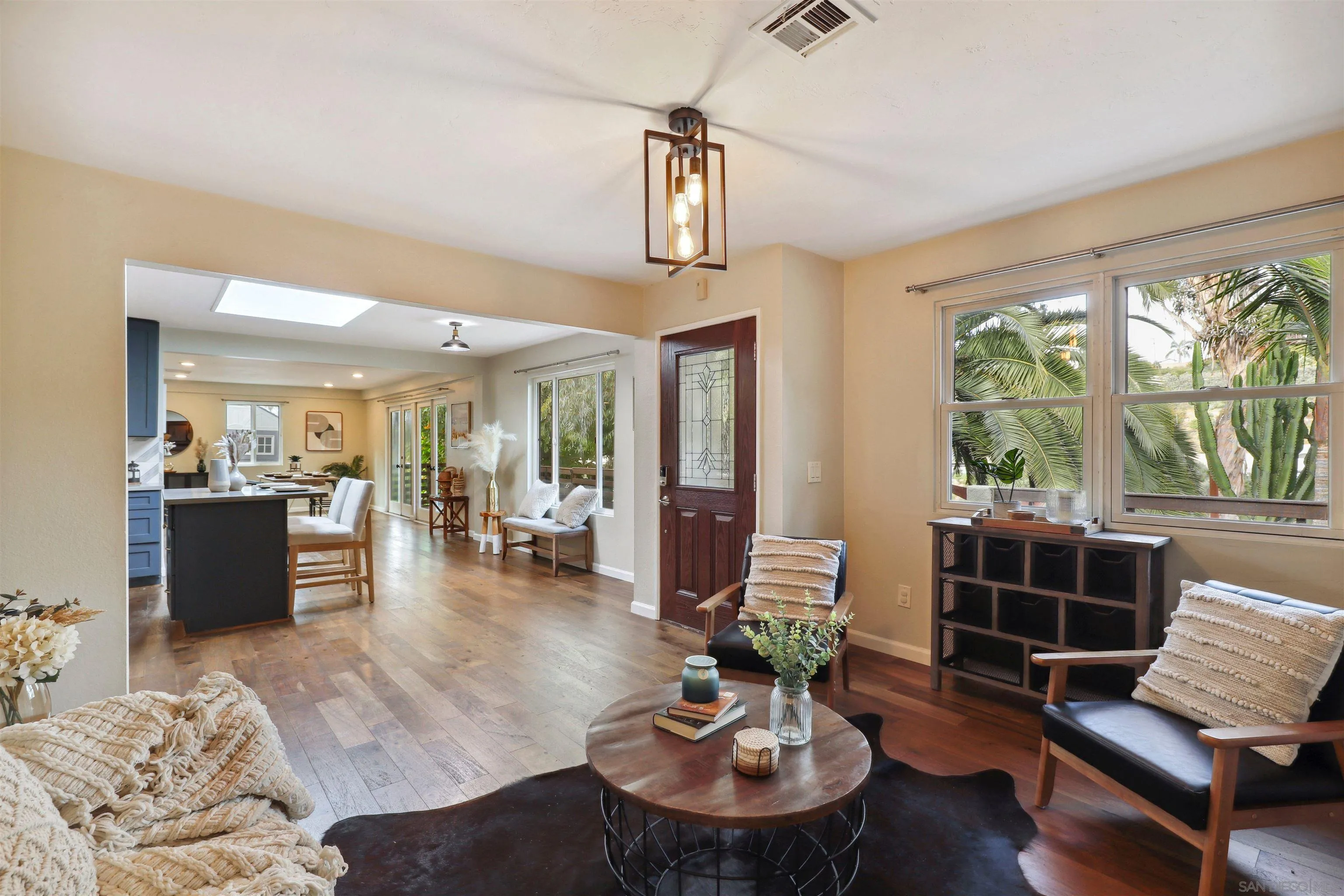 1390 Orpheus Avenue Encinitas, CA 92024 - Photo 5 of 32 a living room with furniture and wooden floor