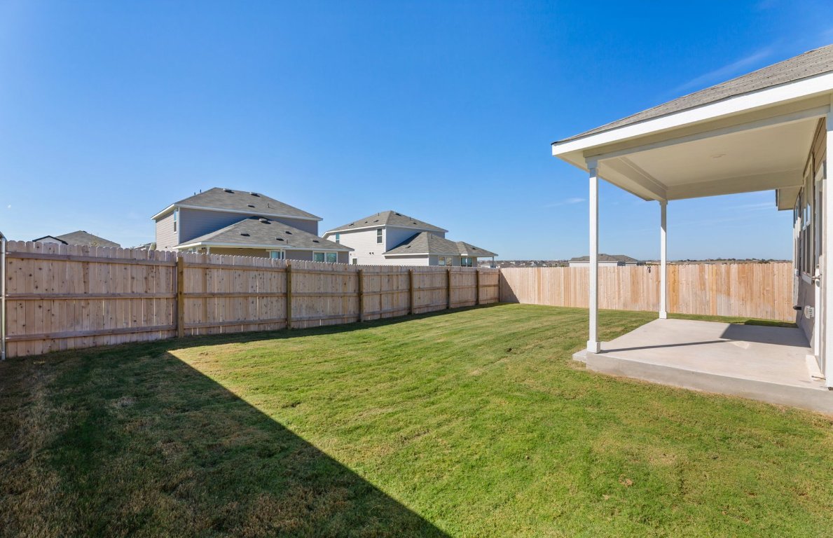 401 The Duke Drive Jarrell, TX 76537 - Photo 22 of 25 a view of a backyard
