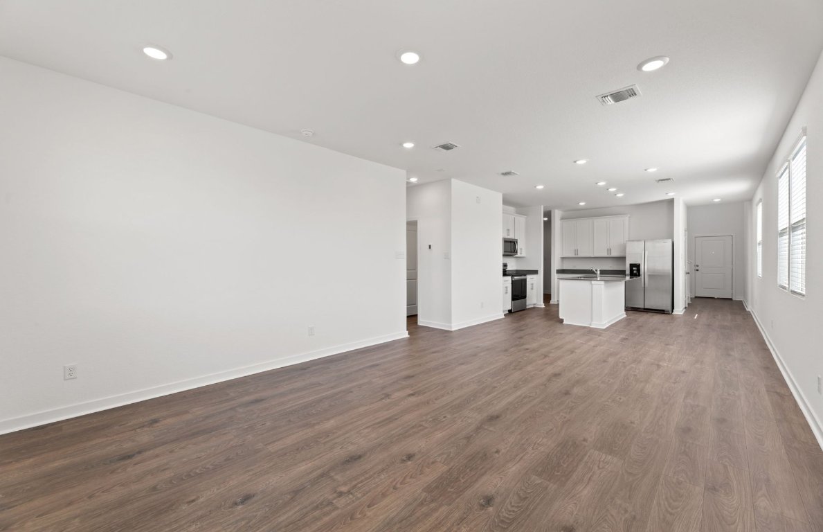 401 The Duke Drive Jarrell, TX 76537 - Photo 6 of 25 a view of kitchen with wooden floor
