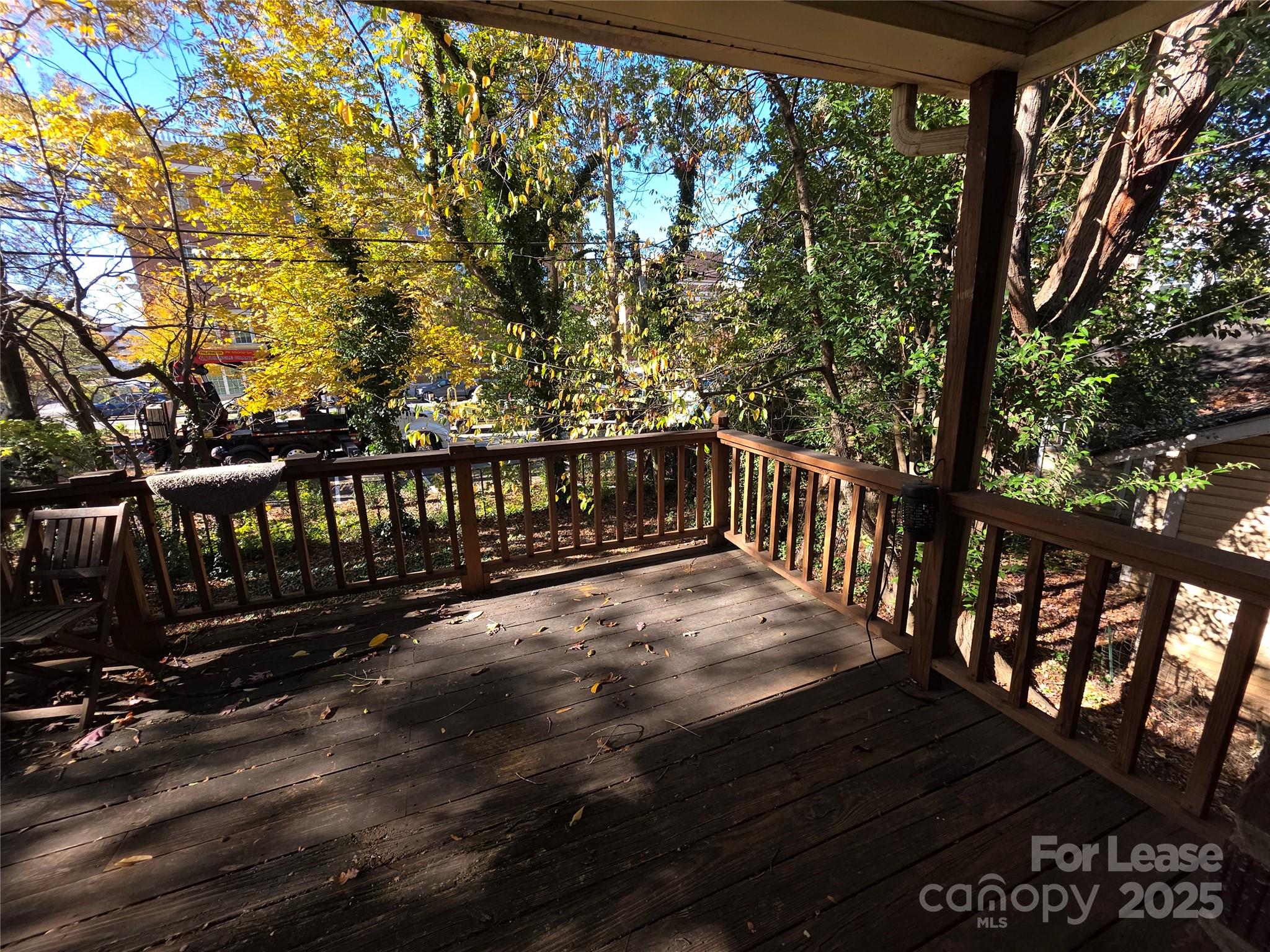1412 Park Drive, Unit 4 Charlotte, NC 28204 - Photo 14 of 14 a view of a deck with a yard