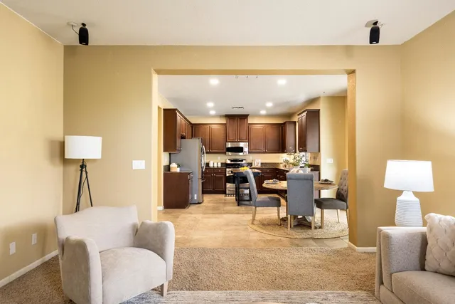 a living room with furniture and a table