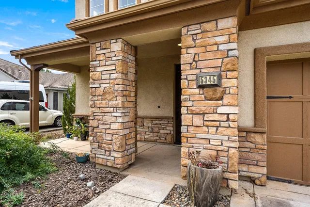 a front view of a house with a garage
