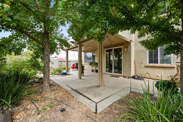 a house with trees in front of it