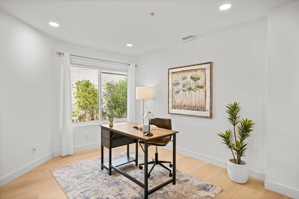 29086 Laurel Valley Drive Vista, CA 92084 - Photo 15 of 39 a workspace with furniture and a potted plant
