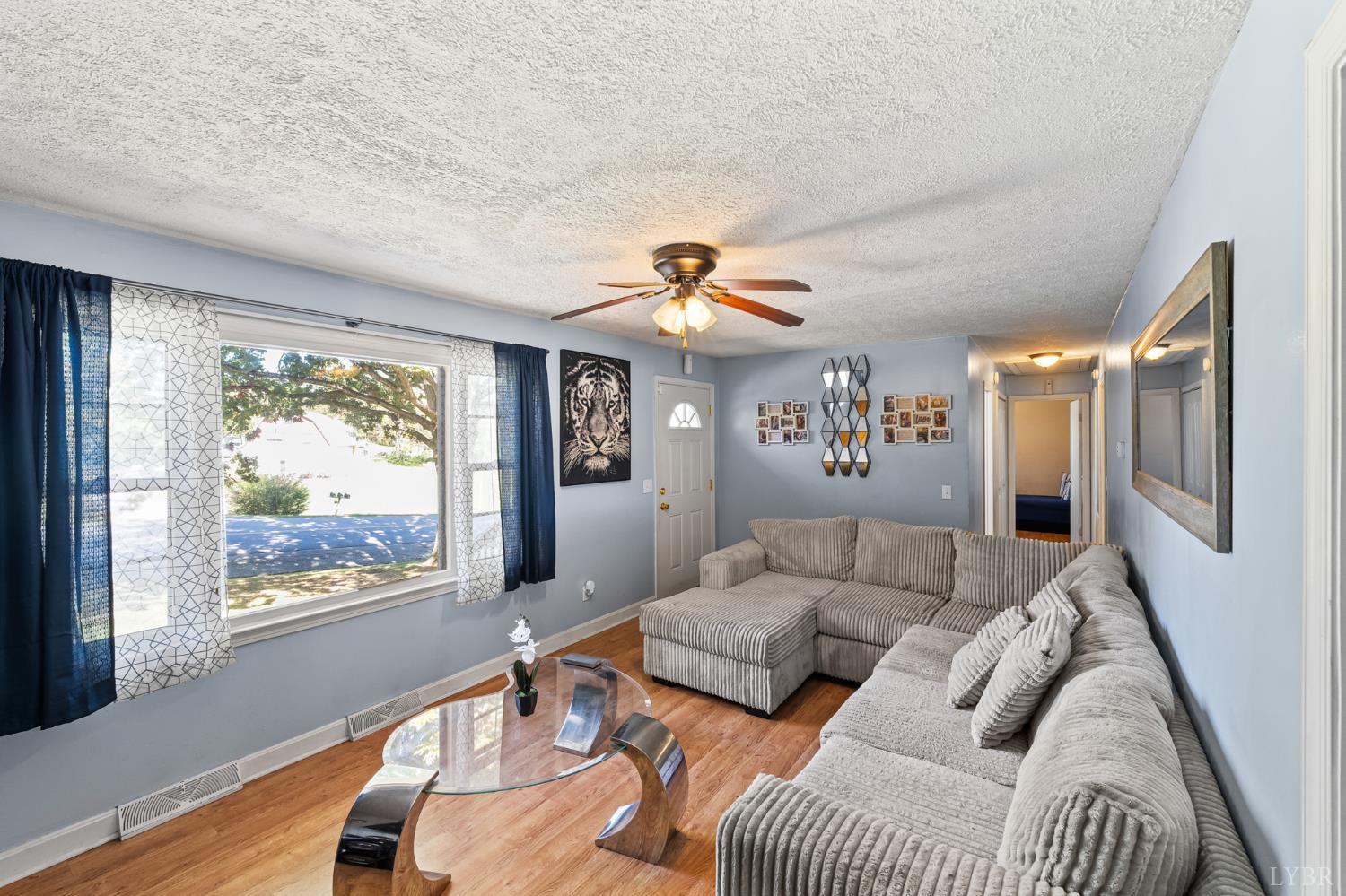 212 Ogden Road Altavista, VA 24517 - Photo 3 of 26 a living room with furniture and a large window